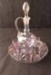 Small liqueur carafe and 7 matching painted glass glasses.