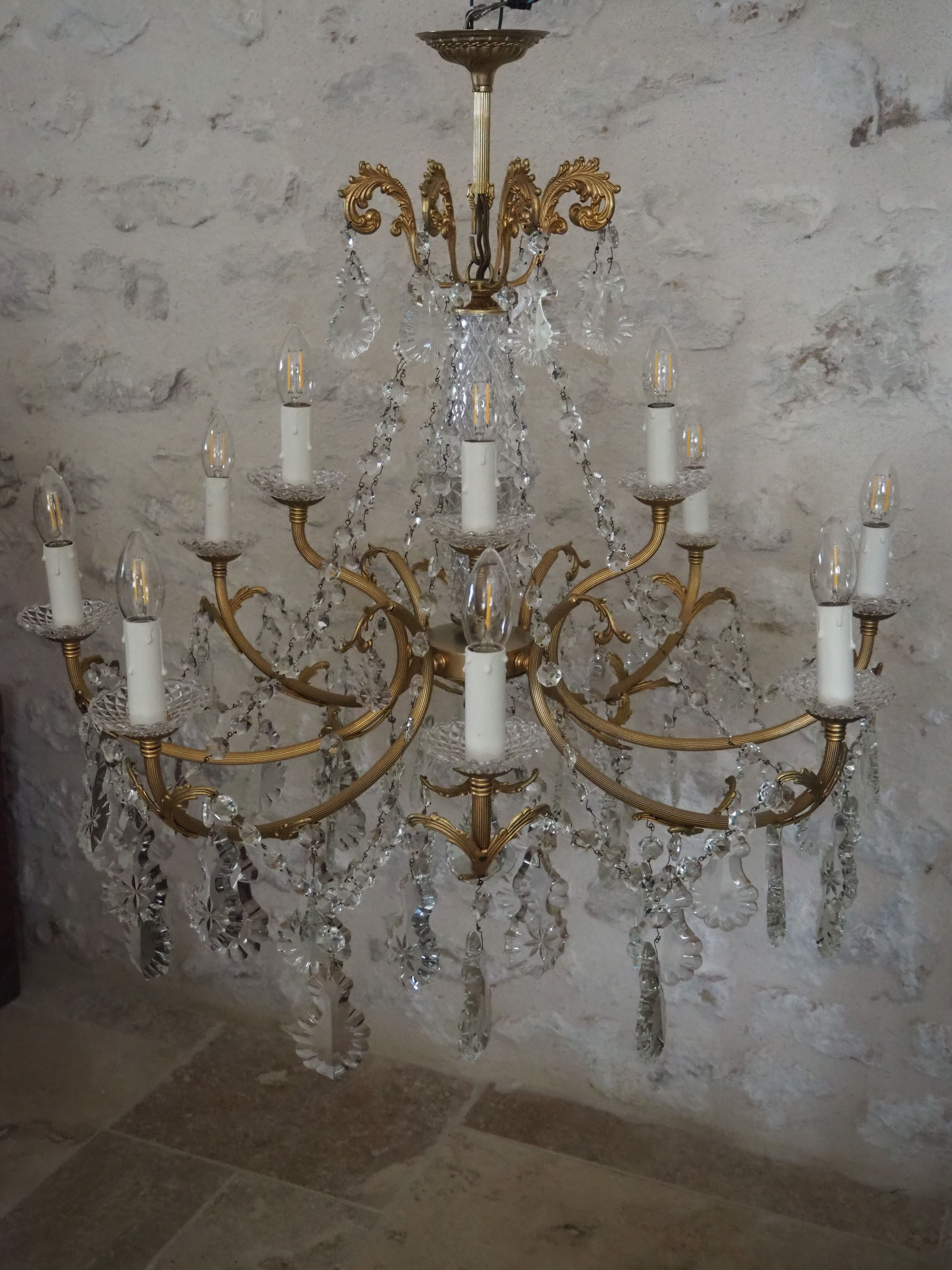 Chandelier 12 lamps with grapevines in crystal, bronze and regulated