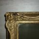 Miroir en bois et stuc redoré de style rocaille 33x29