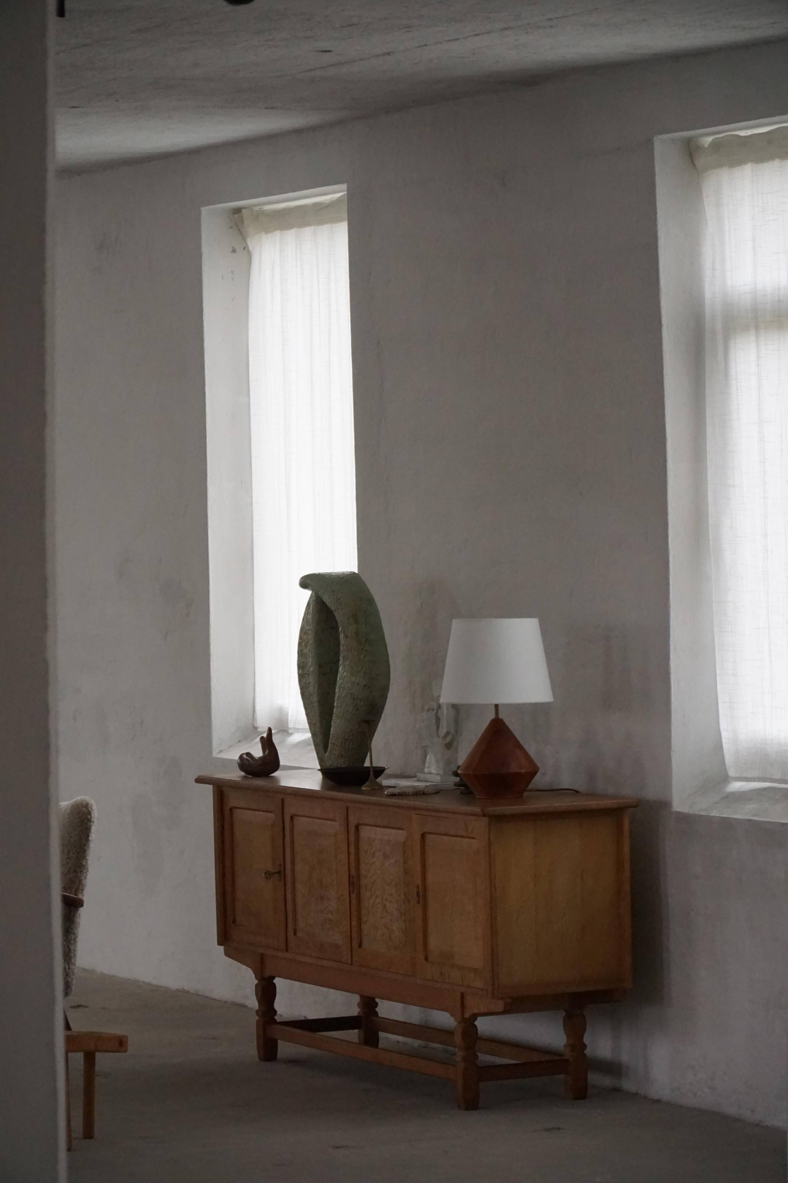 Low oak sideboard, mid-century modern, made by a Danish cabinetmaker, 1960s.