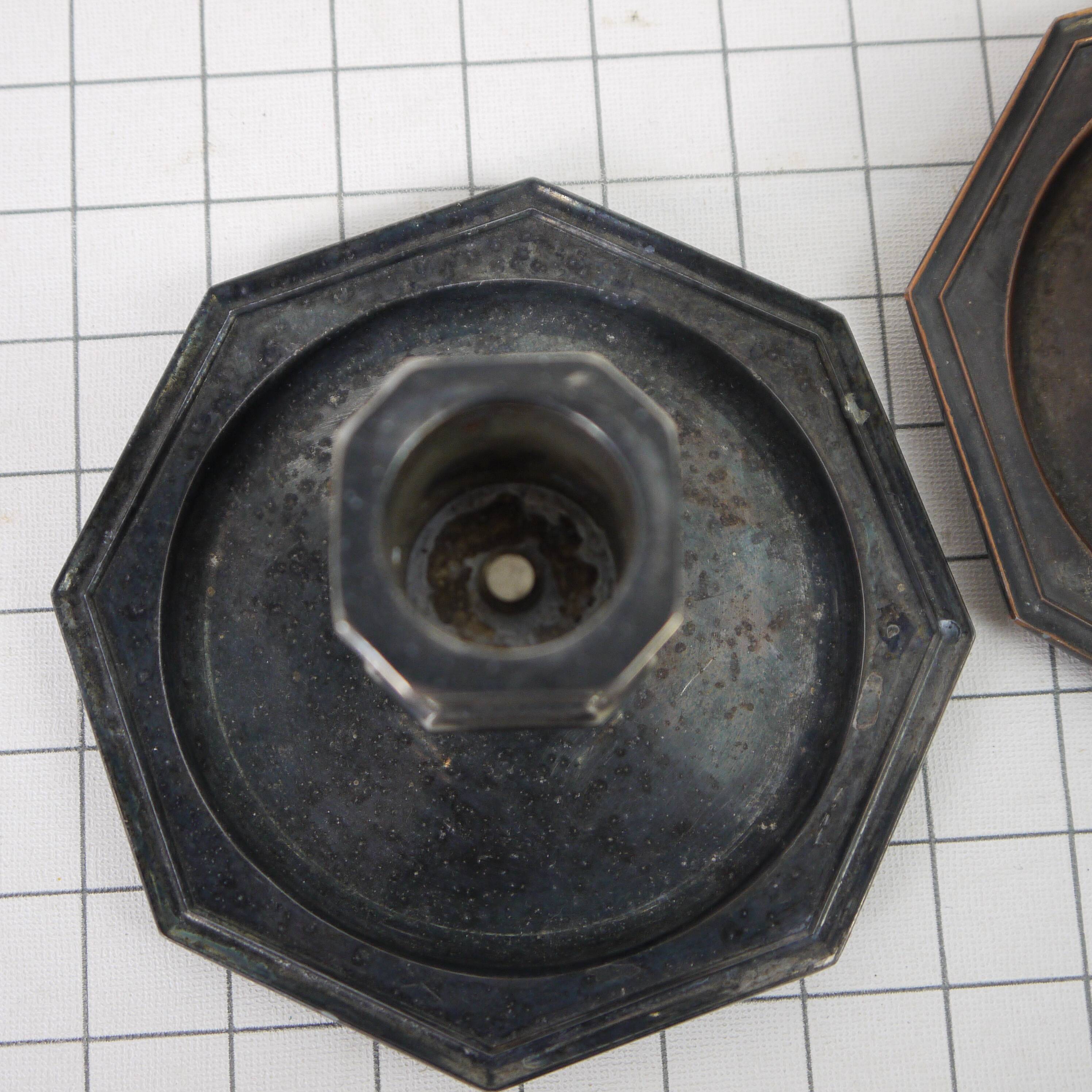 Pair of metal candlesticks