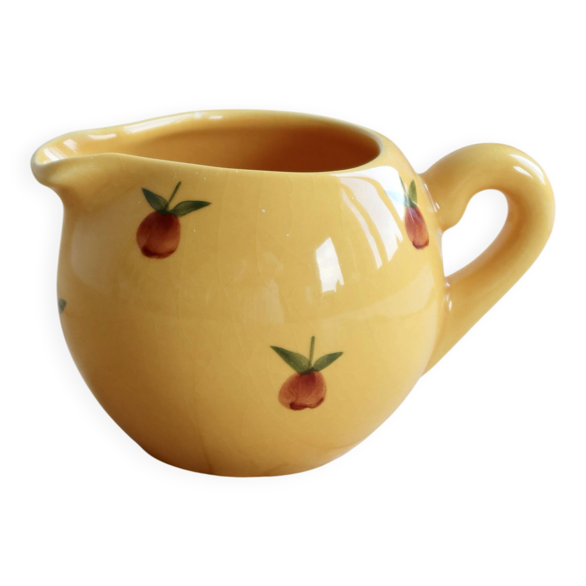 Vintage yellow ceramic milk jug
