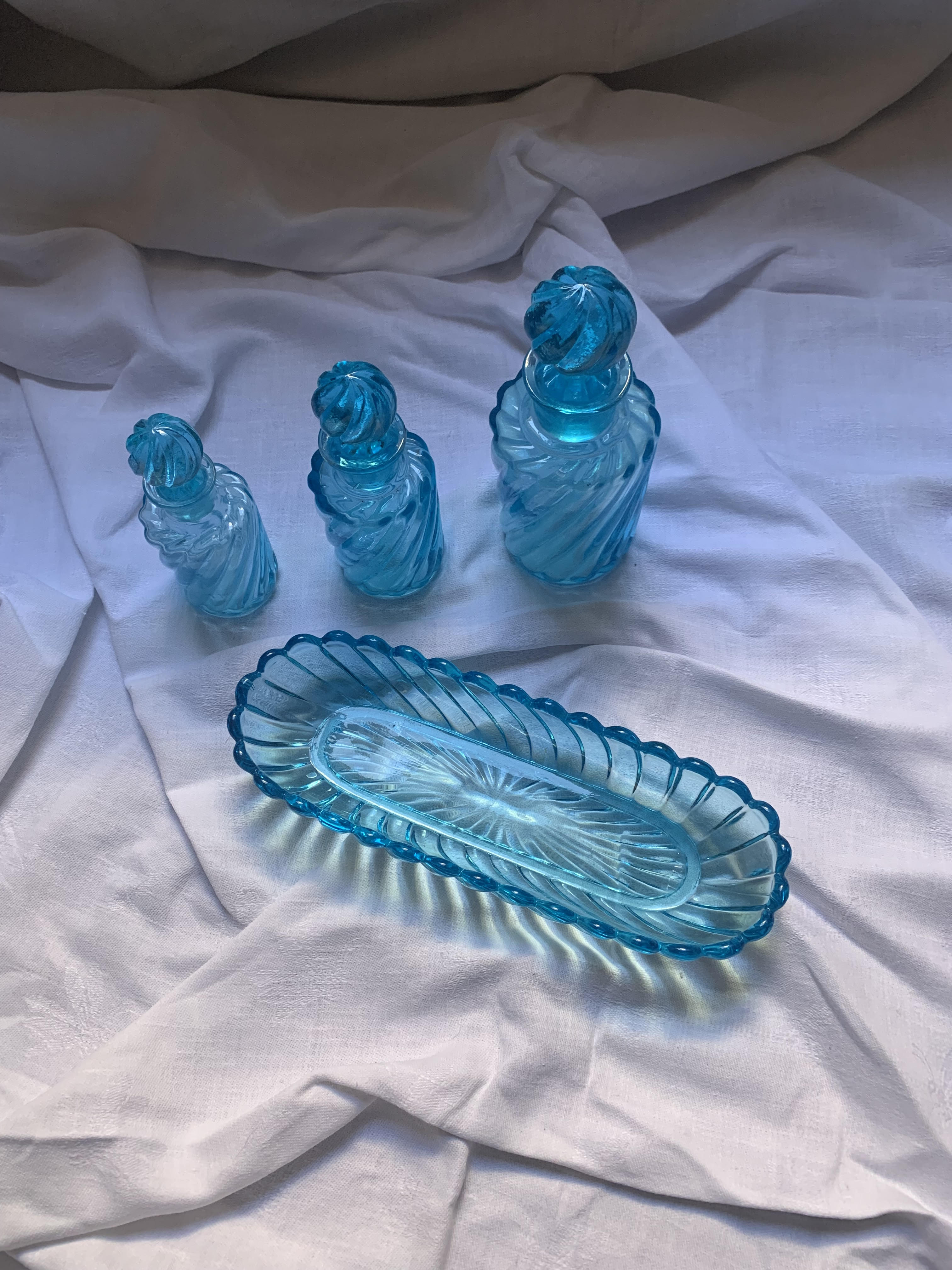 Toiletries and vintage blue glass bottles