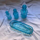 Toiletries and vintage blue glass bottles