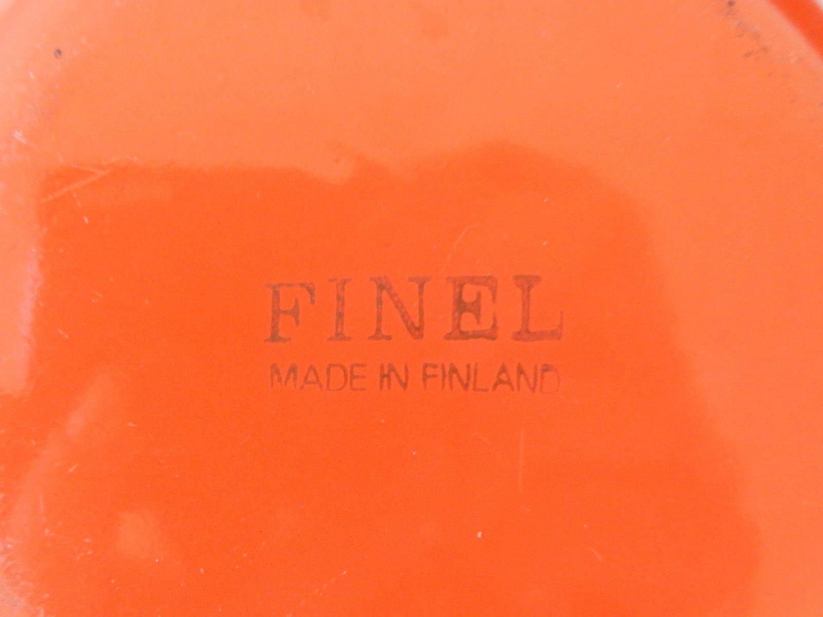 Orange-red enamelled bowls by Kaj Franck for Finel 1960s