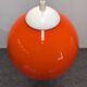 Pair of orange opaline ball pendant lights from the 60s/70s
