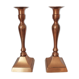 Set of a pair of candle holders and a hand candle holder