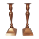 Set of a pair of candle holders and a hand candle holder
