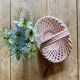Vintage pink woven ceramic basket