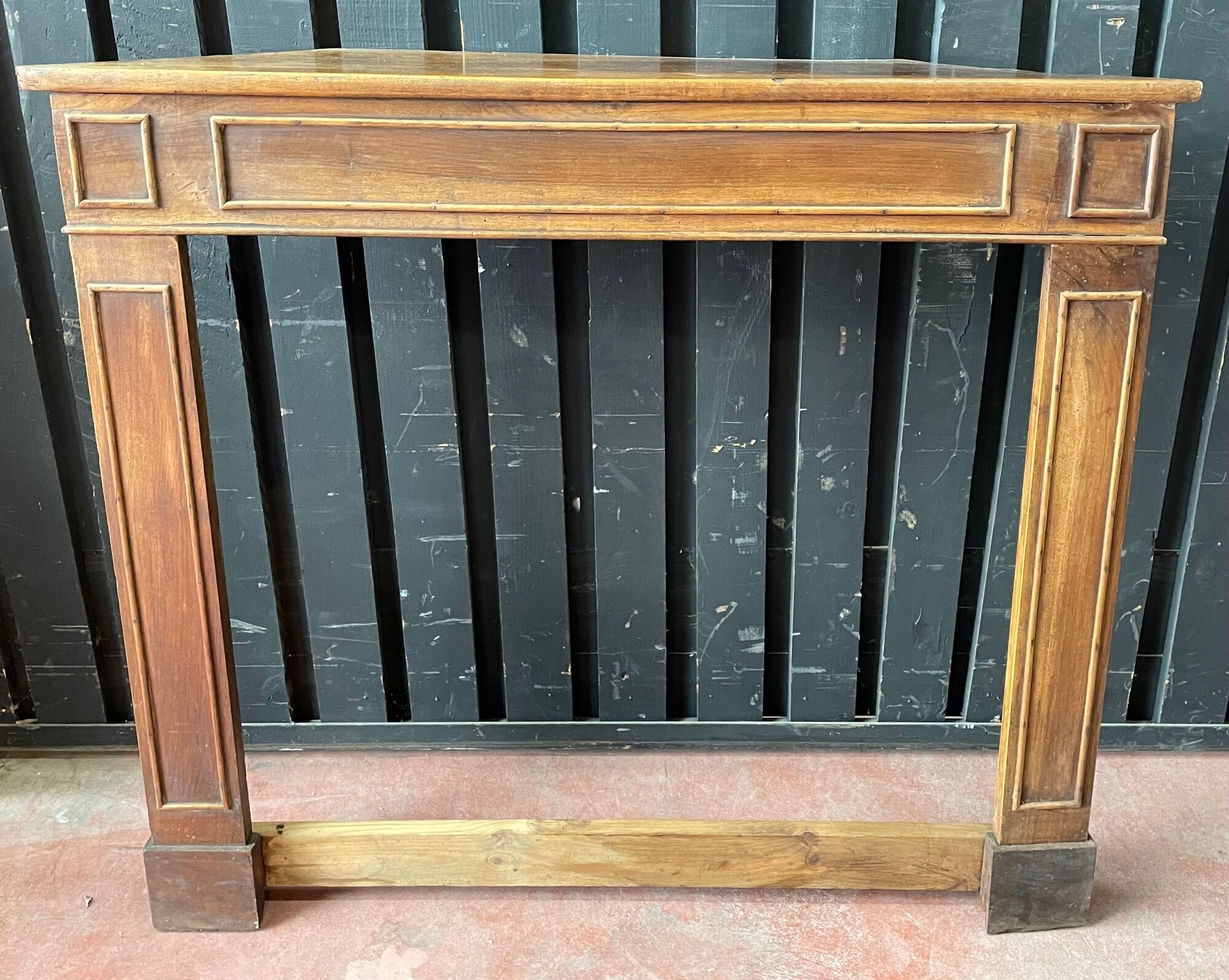 Front or frame or facade of fireplace of the nineteenth century in walnut wood carved by hand.