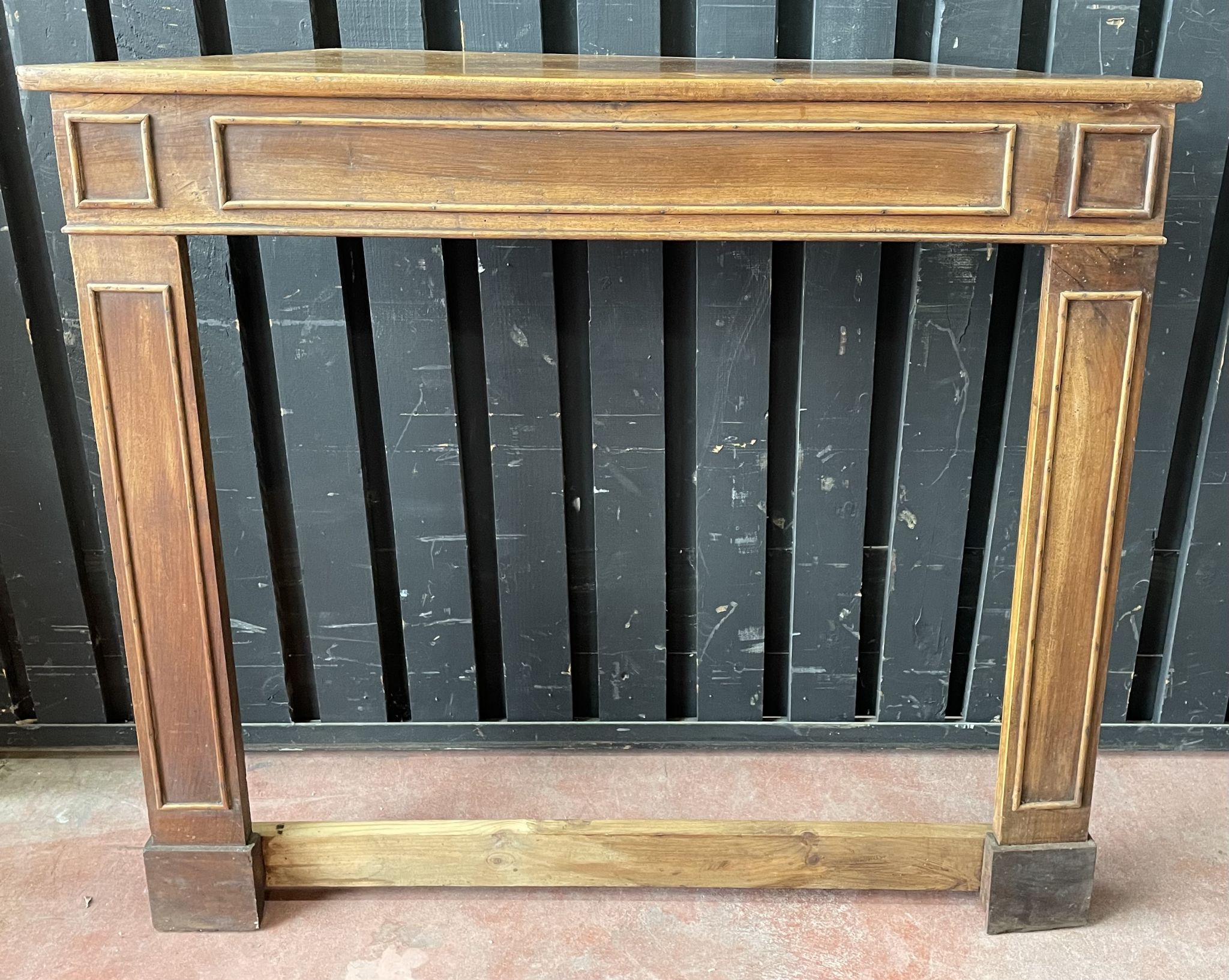Front or frame or facade of fireplace of the nineteenth century in walnut wood carved by hand.