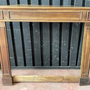 Front or frame or facade of fireplace of the nineteenth century in walnut wood carved by hand.