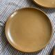 8 assiettes plates en grès de Berne vintage