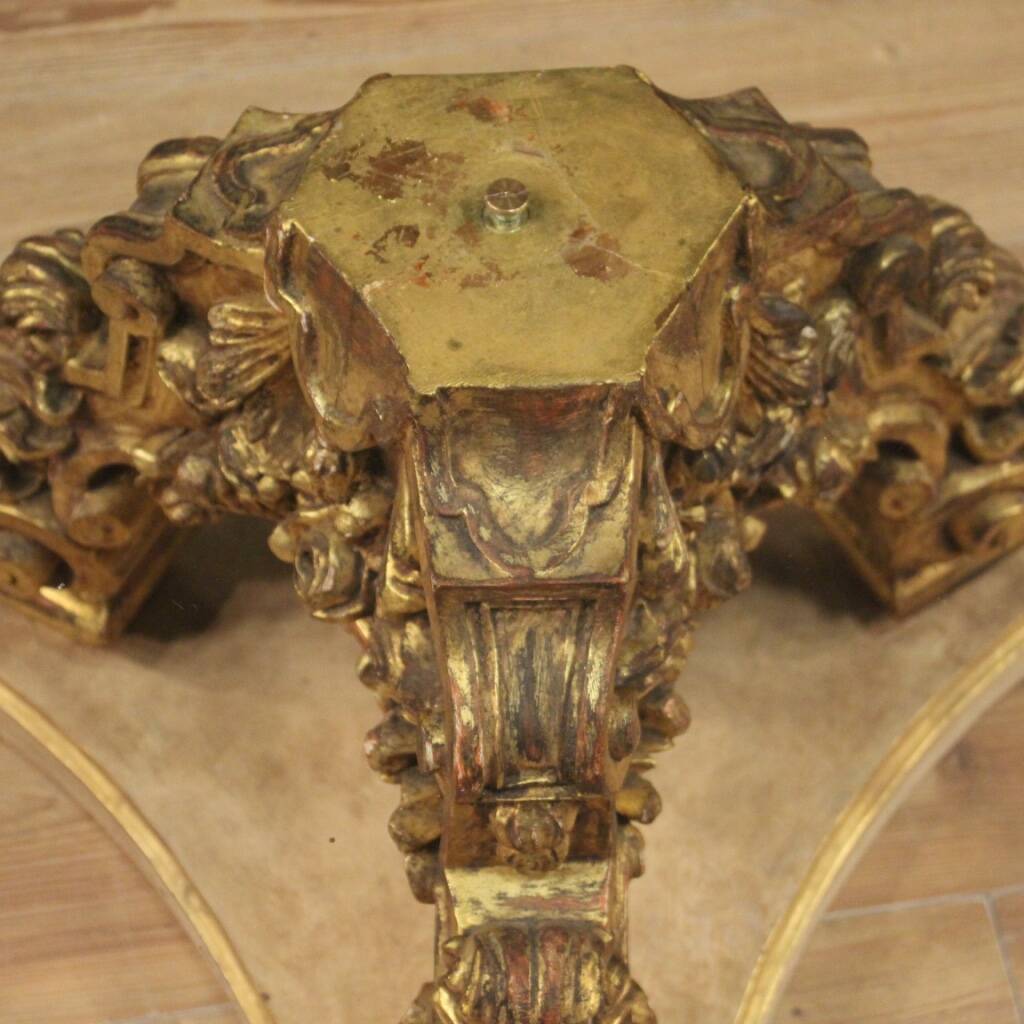 Italian lacquered and gilded round coffee table with glass top