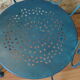 A pair of metal garden chairs