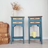 Blue wooden bedside tables with floral patterns