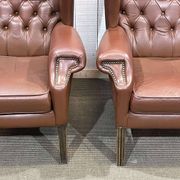 Pair of 1970s Chesterfield wingback chairs in brown leather