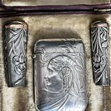 Art nouveau, silver metal smoking objects in case circa 1900