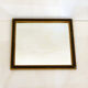 Miroir noir et frises de perles dorées - 42x42cm
