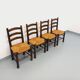Set of 4 vintage brutalist chairs by Georges Robert in wood and straw.