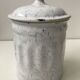 Vintage coffee pot in white enamelled iron and blue retro kitchen decoration