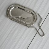 Foie gras set in shiny silver metal