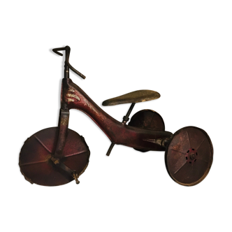 tricycle in early 1900 in dark red