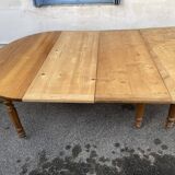 8-legged ash table with 6 extensions.