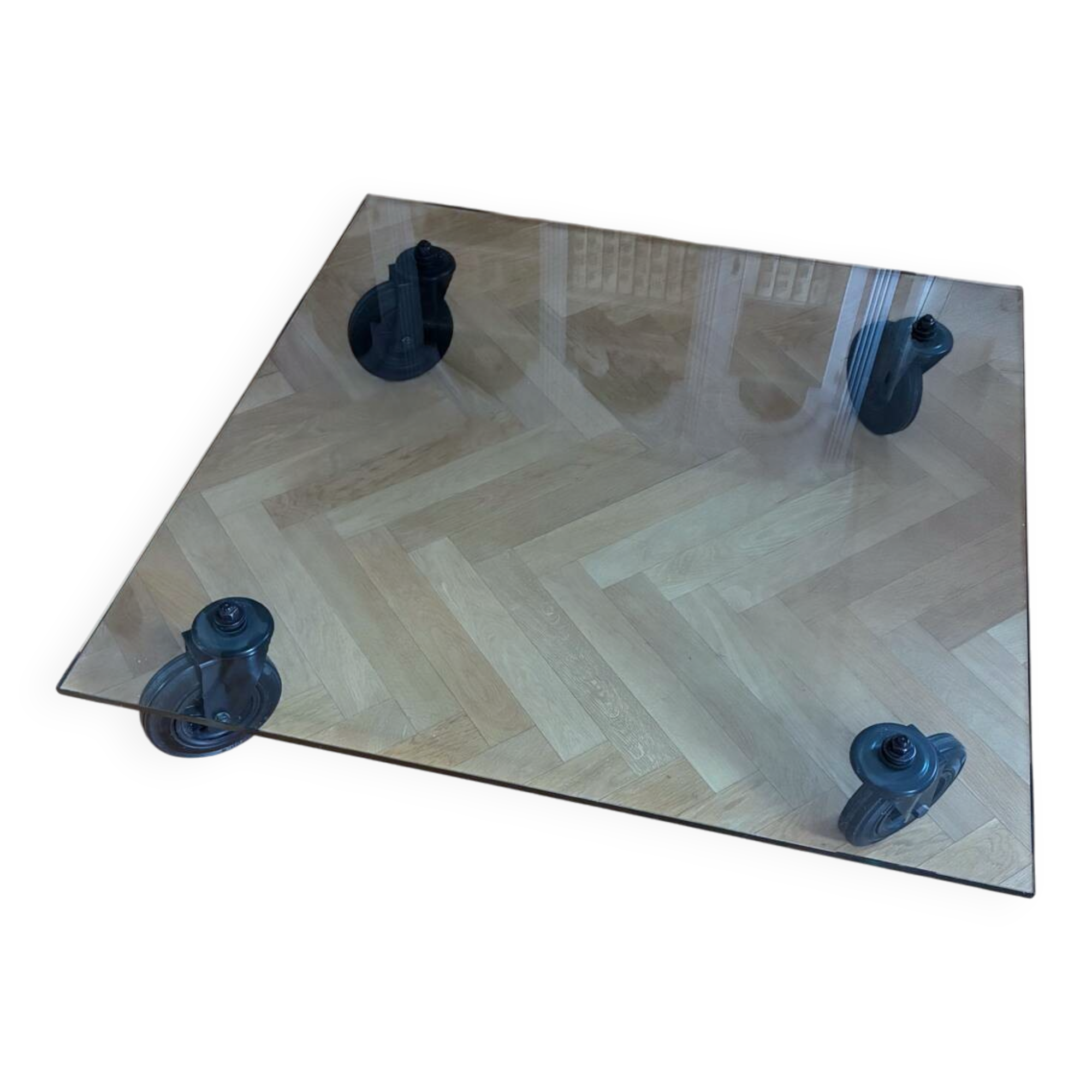 Four-wheeled tables by Gae Aulenti for Fontana Arte