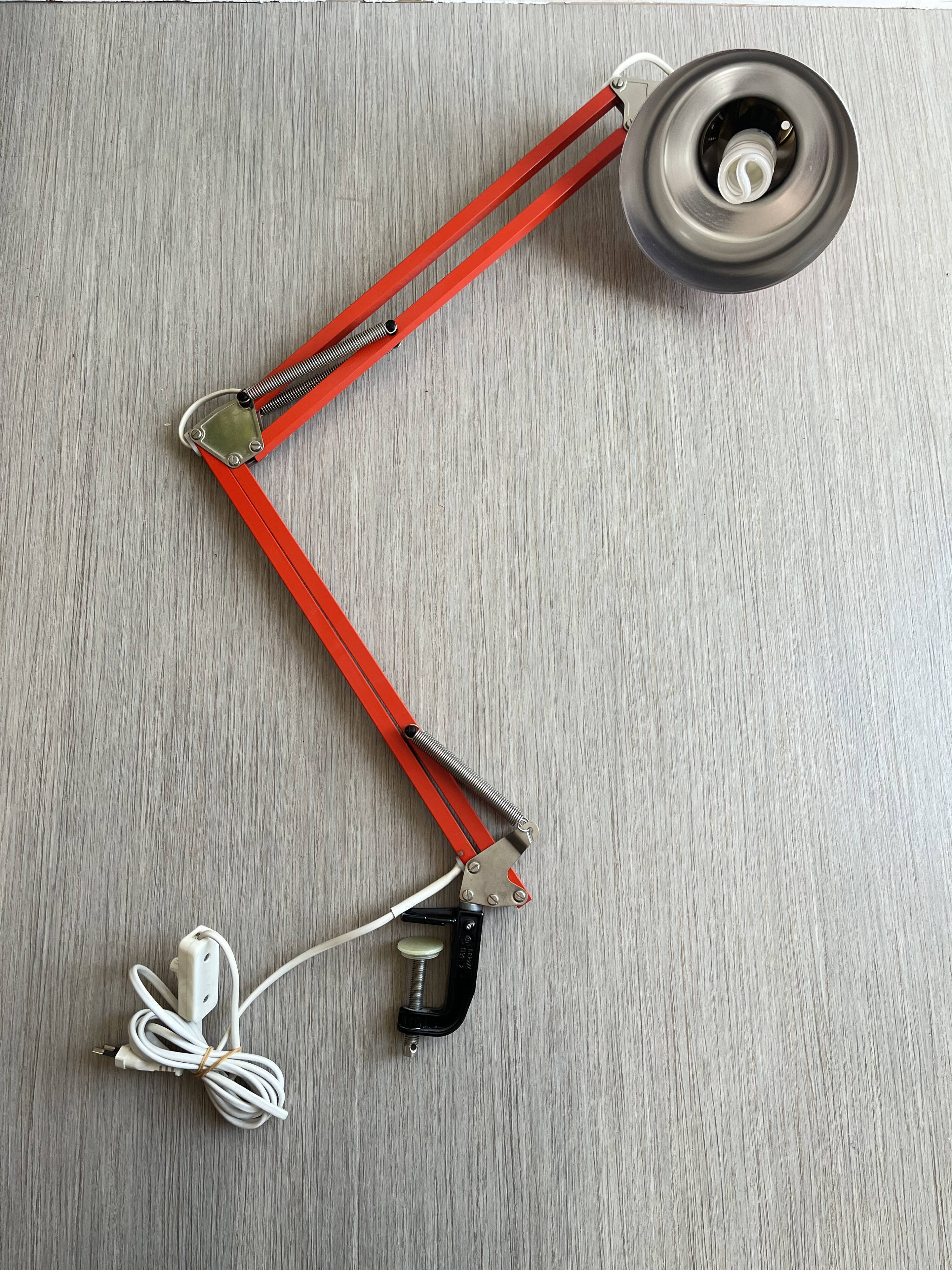 Vintage orange articulated desk lamp