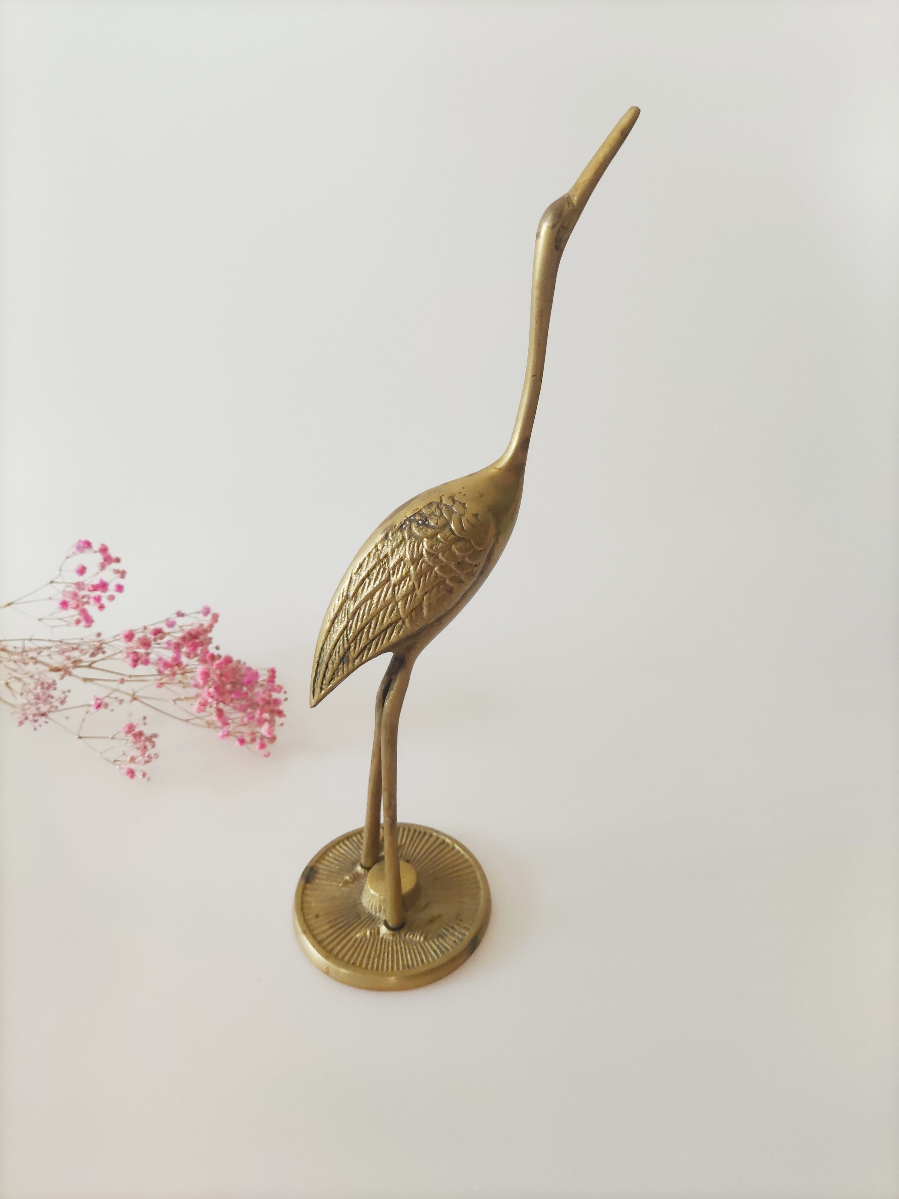 Heron brass statuette