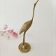 Heron brass statuette