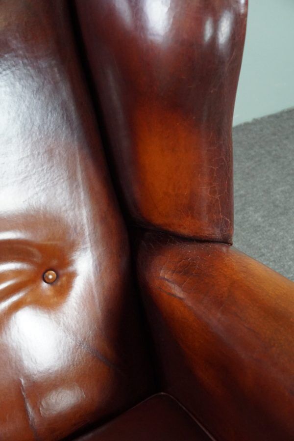 Patinated sheepskin armchair