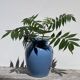 Minimalist plain blue ceramic baluster vase