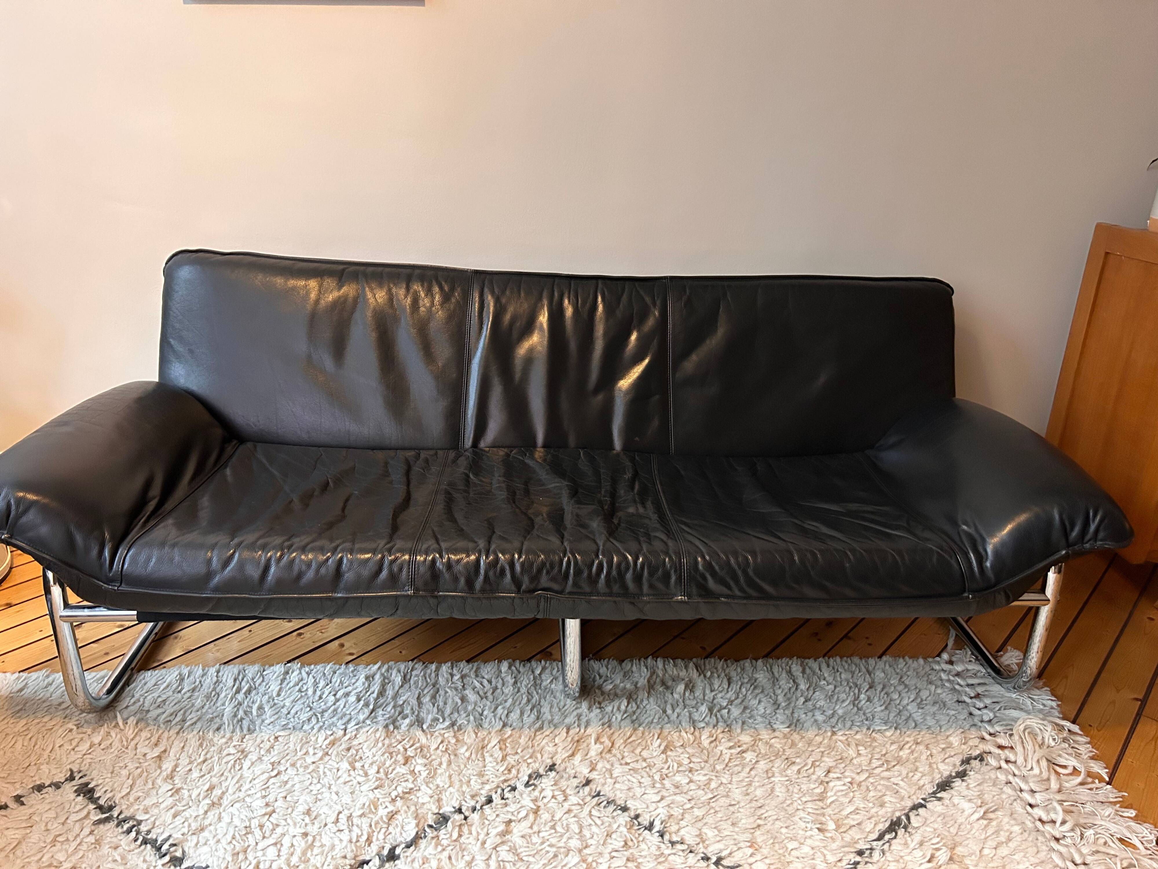 Black leather sofa designed by Johan Bertil Häggström