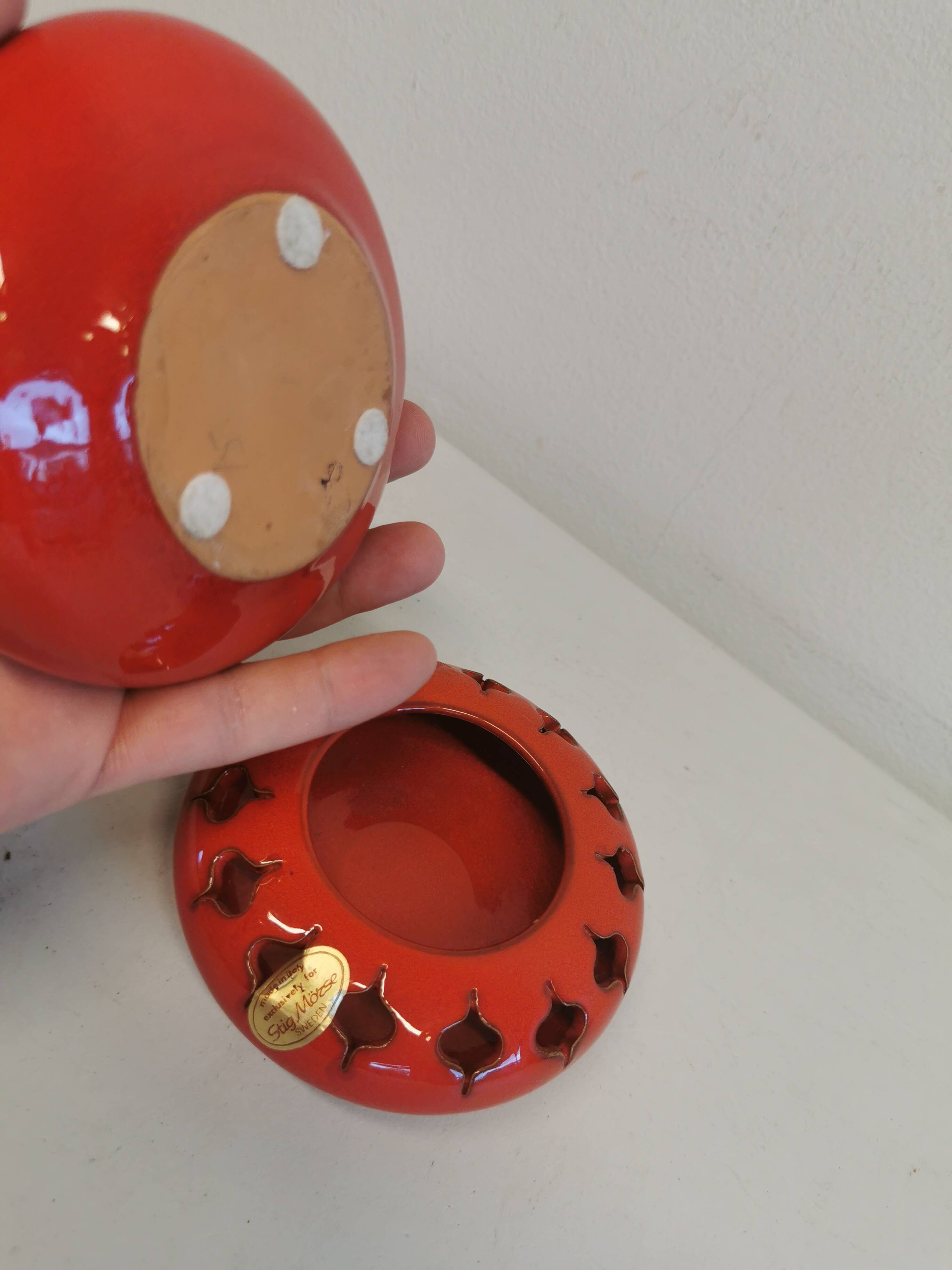 Pair of candle holders from the 1960s-1970s, crafted in red ceramic