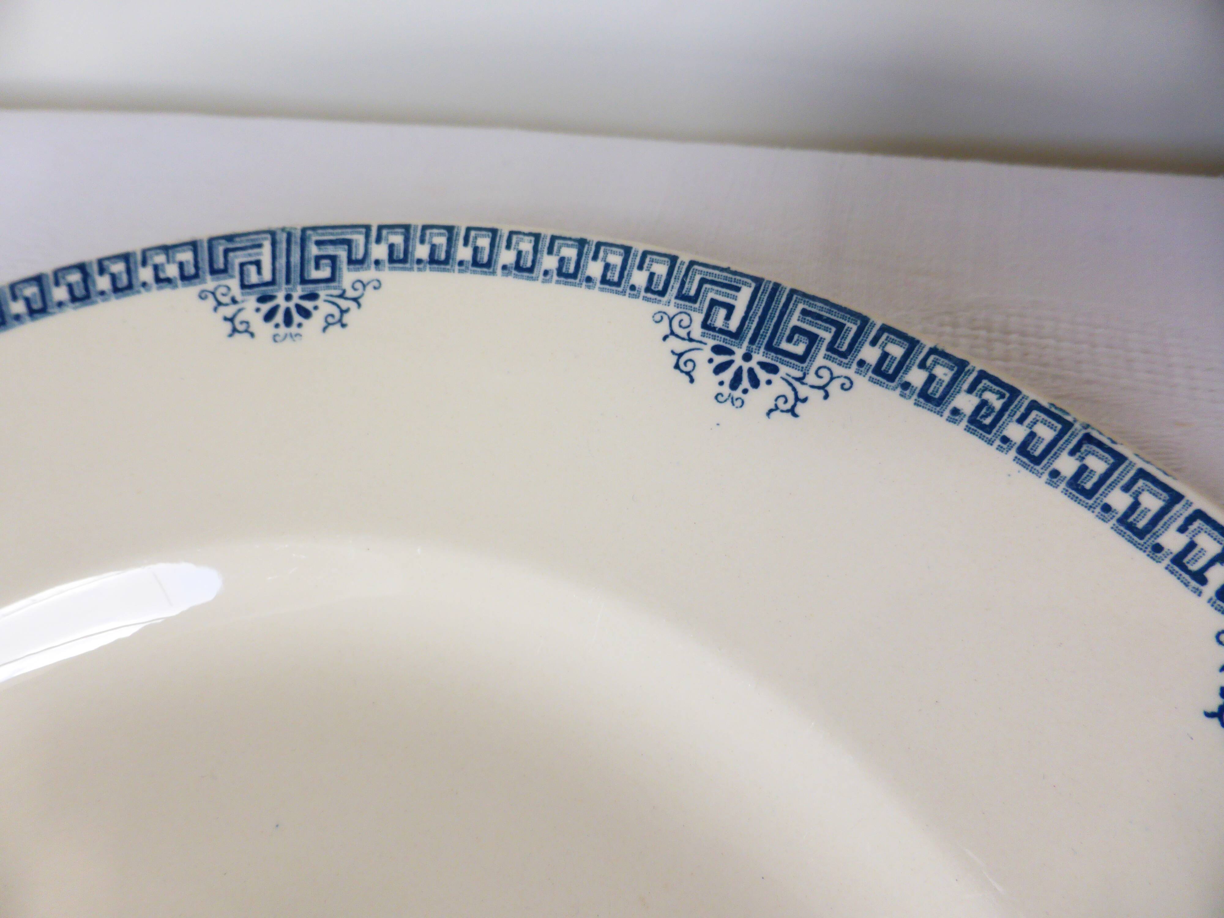 Round dish of Longwy model Athens porcelain