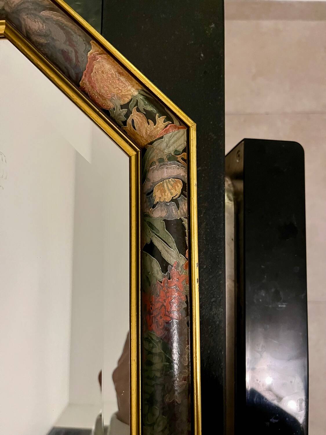 Vintage beveled mirror with floral frame