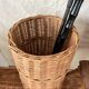 Woven wicker basket, vintage rod holder