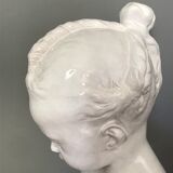 Child bust in enamelled terracotta