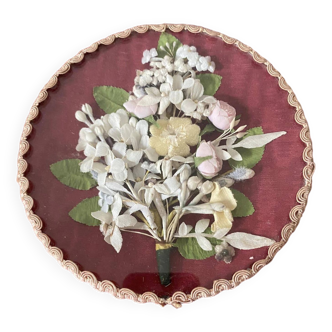 Round frame bouquet of flowers in fabric under non-curved glass