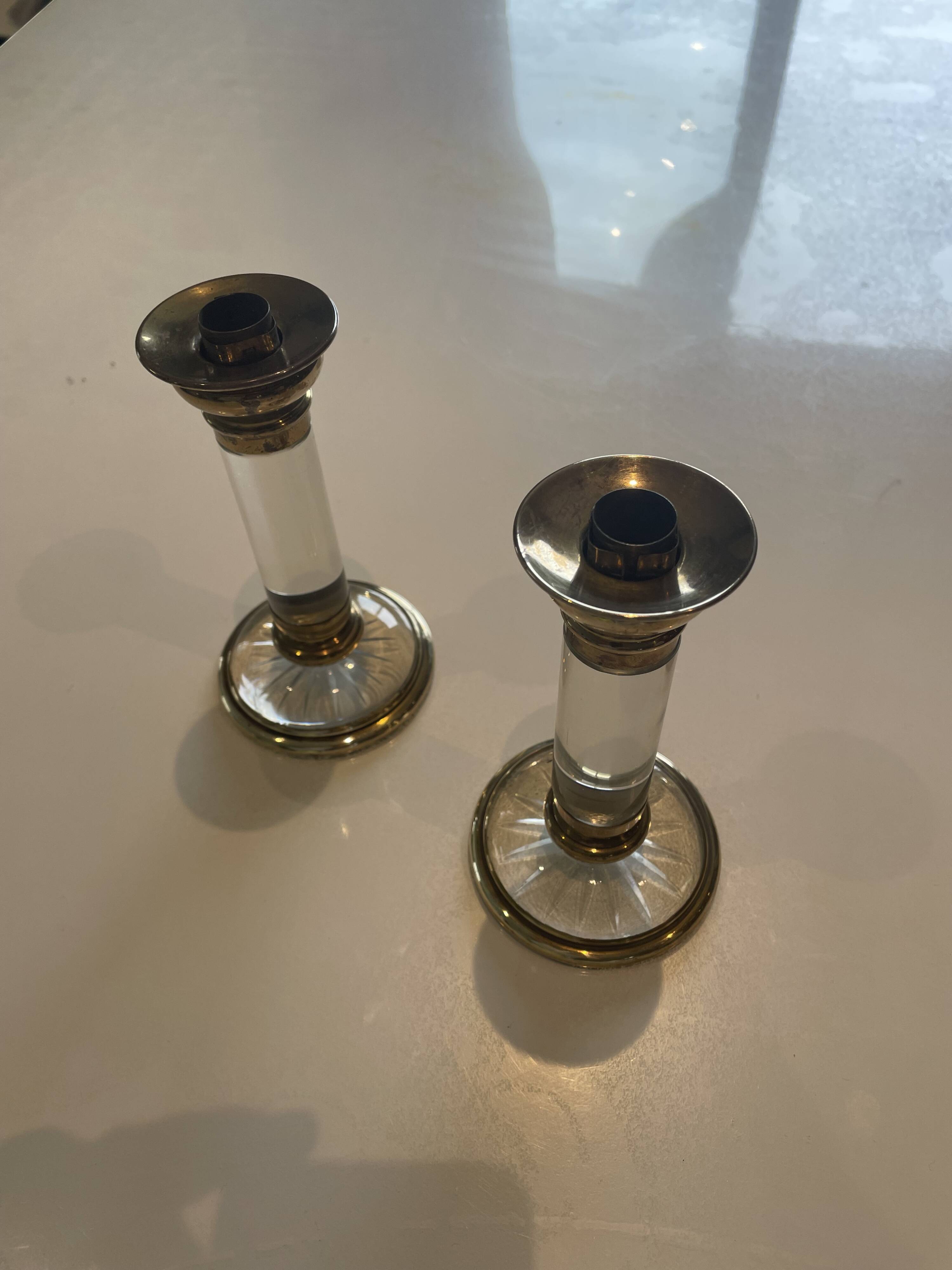 Pair of candlestick holders in crystal and gilded brass, Baccarat decoration.