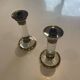 Pair of candlestick holders in crystal and gilded brass, Baccarat decoration.