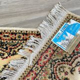 Beige mechanical carpet 80s