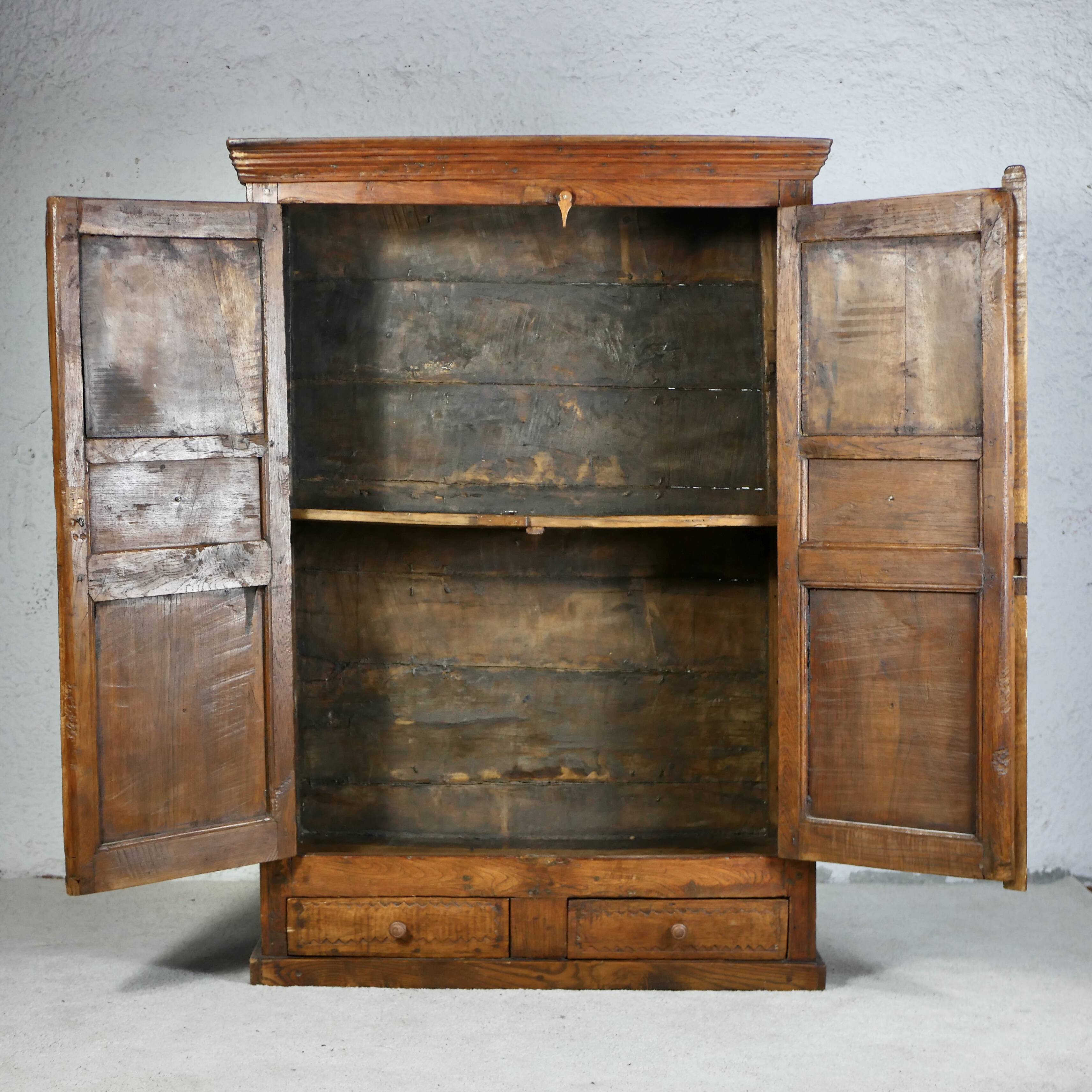 Antique carved wooden cabinet