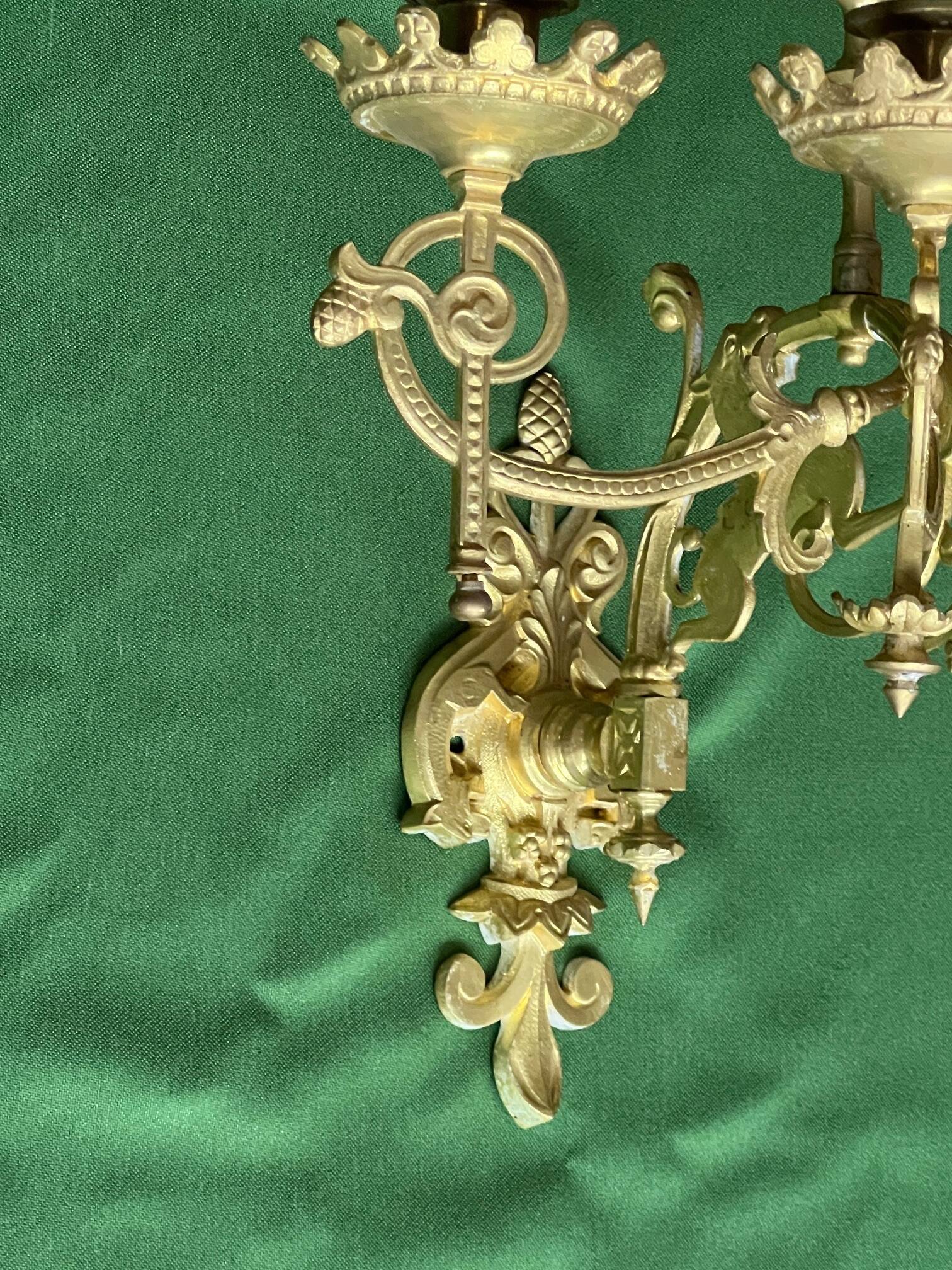 Pair of neo-Gothic wall sconces. Solid gilt bronze.