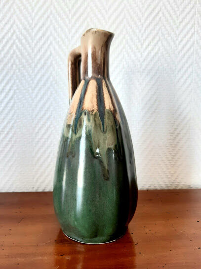 Set of art nouveau ceramic pitchers