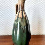 Set of art nouveau ceramic pitchers