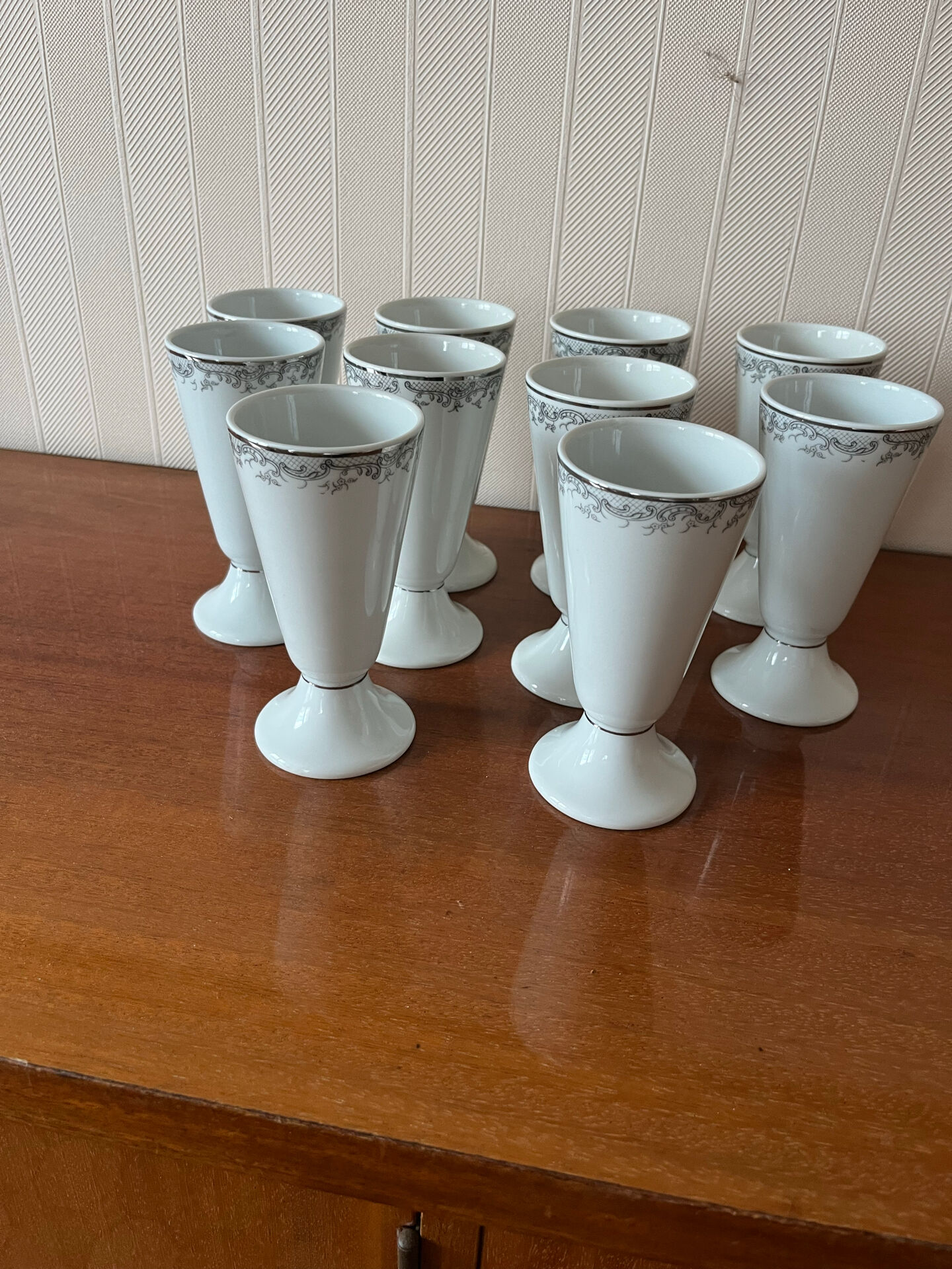 Lot of 10 Limoges porcelain mazagrans.