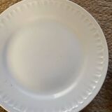 5 mismatched old white plates.